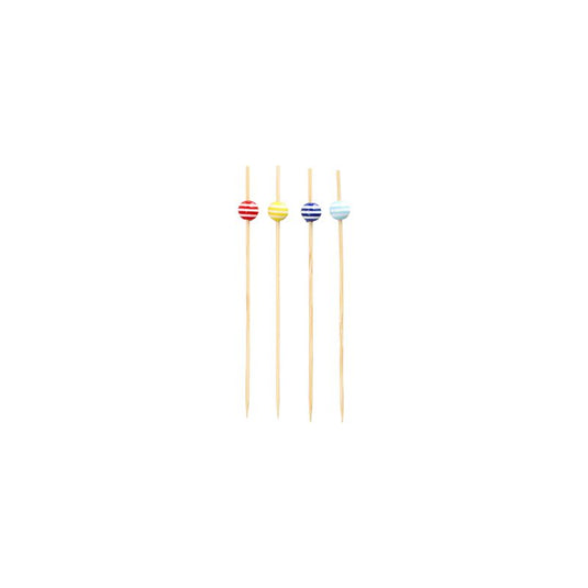 Four 12 cm large PAPSTAR finger food skewers, each decorated with a striped bead in red, yellow, blue, and light blue, are arranged in a row. The stylish products of PAPSTAR GmbH are made as sustainable disposable products and rest elegantly on a simple white background.