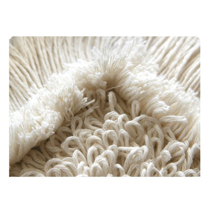 A close-up of the Arcora First Mop Blue from Arcora International GmbH shows its textured blue fibers - ideal for enhancing your floor coverings and easy to maintain through regular cleaning.