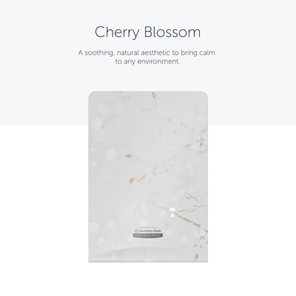 The rectangular Kimberly-Clark Professional™ Icon™ Dispenser Faceplate-eSkinCare (20.32 x 27.30 x 3.81 cm) from Kimberly-Clark GmbH features a white-light gray marbled design with gold accents, giving any washroom a soothing, elegant touch.