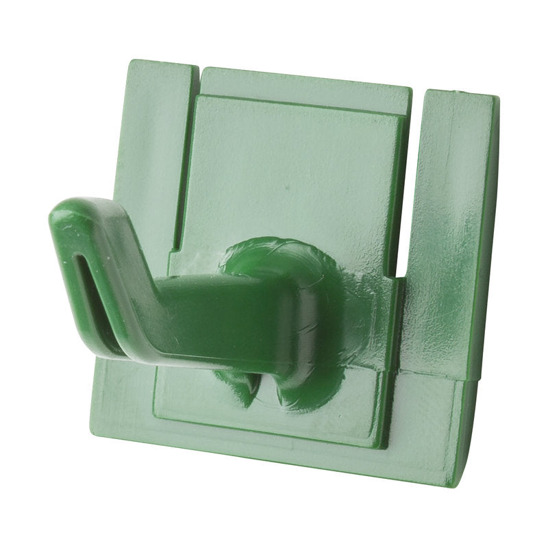 The Haug Bürsten KG REPLACEMENT HANDLE HOLDER HOOK 42x32x31mm, for Art.8699, is a green plastic wall hook with a rectangular base and a single angled hook, ideal for hanging tools or small items.
