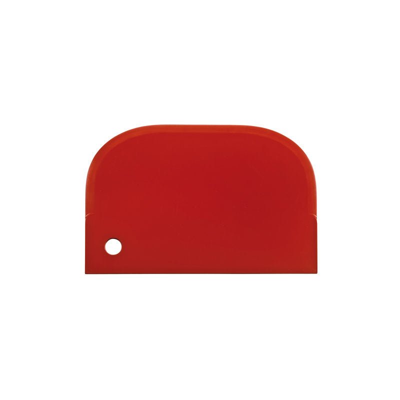 A red, flexible, rectangular METAL DETECT SCRAPER SMALL (150x97mm, PP) from Haug Bürsten KG with a rounded top edge and a small hole in the lower left corner, depicted on a white background.