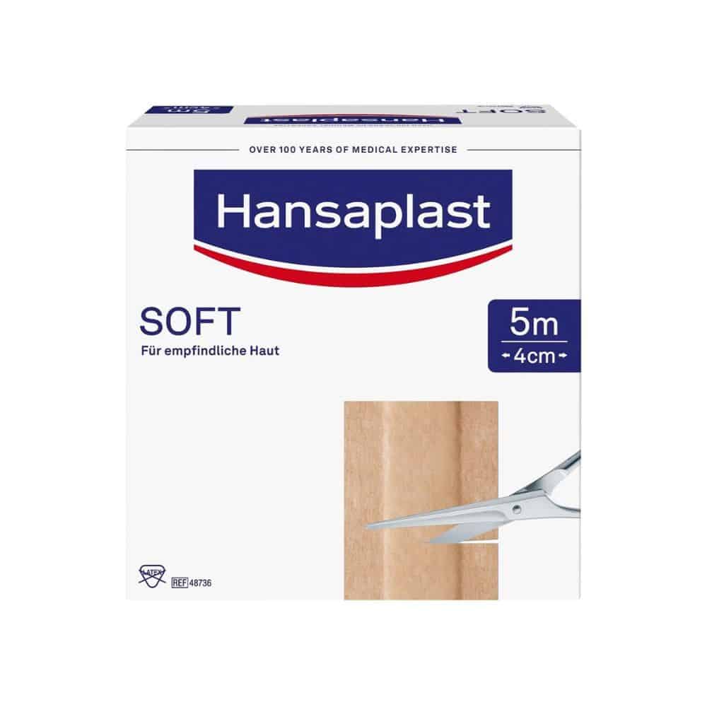 A box with Hansaplast Soft Plasters from Beiersdorf AG, with the label "for sensitive skin" in German, measuring 5 cm x 4 cm wide. The packaging is equipped with scissors for cutting.