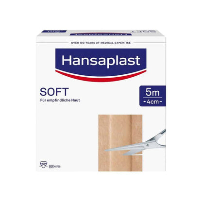 A box with Hansaplast Soft Plasters from Beiersdorf AG, with the label "for sensitive skin" in German, measuring 5 cm x 4 cm wide. The packaging is equipped with scissors for cutting.