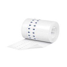 A roll of white toilet paper with a blue arrow pattern, partially unrolled and covered with Hartmann Omnifix silicone fixation fleece from Paul Hartmann AG, isolated on a white background.