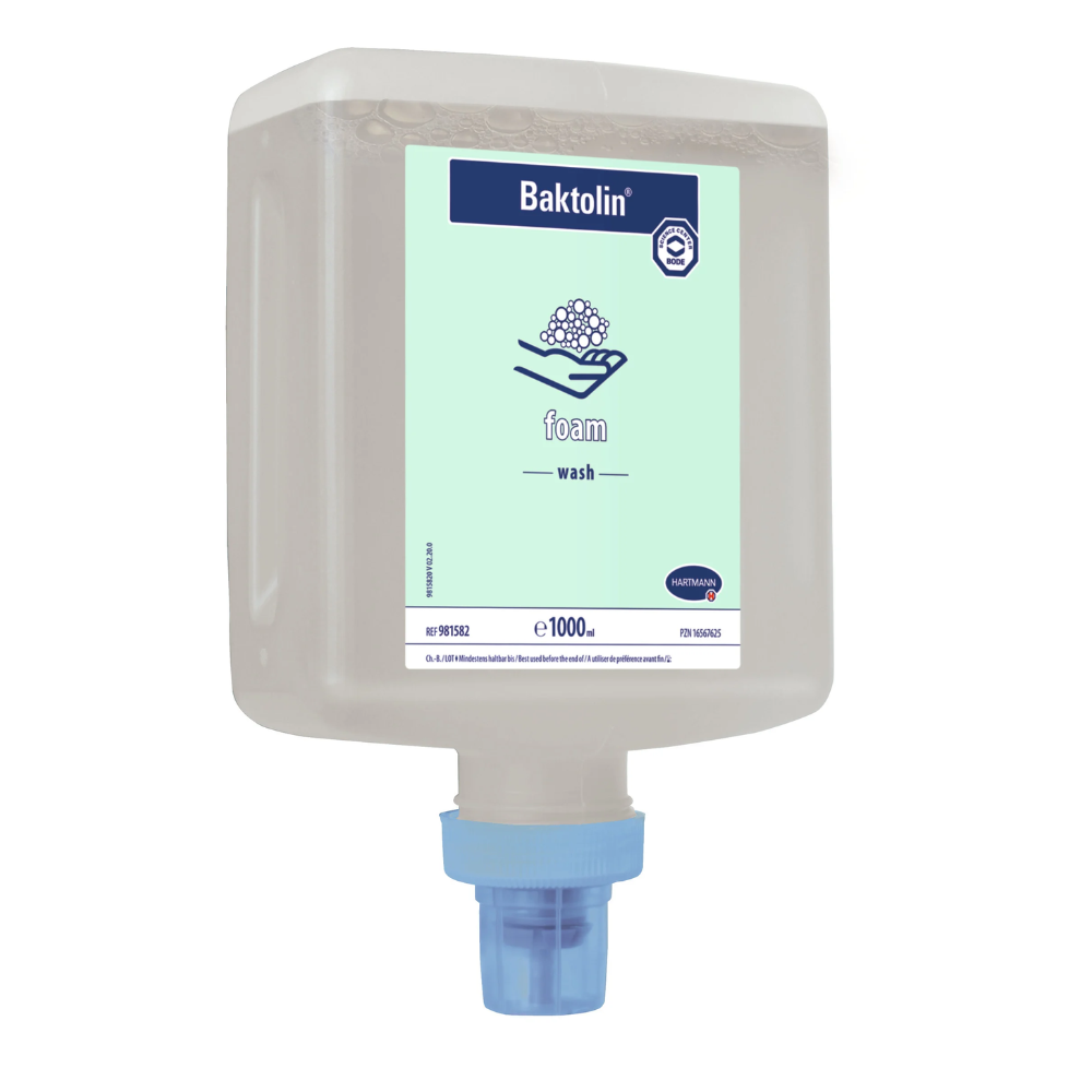 A wall-mounted dispenser bottle with Hartmann Baktolin® Foam hand cleansing foam from Paul Hartmann AG with a blue dispenser nozzle labeled with a fill quantity of 1000 ml hand wash soap. The bottle design includes product information and