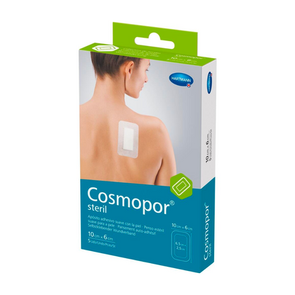 A box of Hartmann Cosmopor® Sterile Wound Dressing Plasters. It depicts a woman applying a dressing to her shoulder for postoperative wound care. The packaging lists size specifications and mentions that the product is sterile.