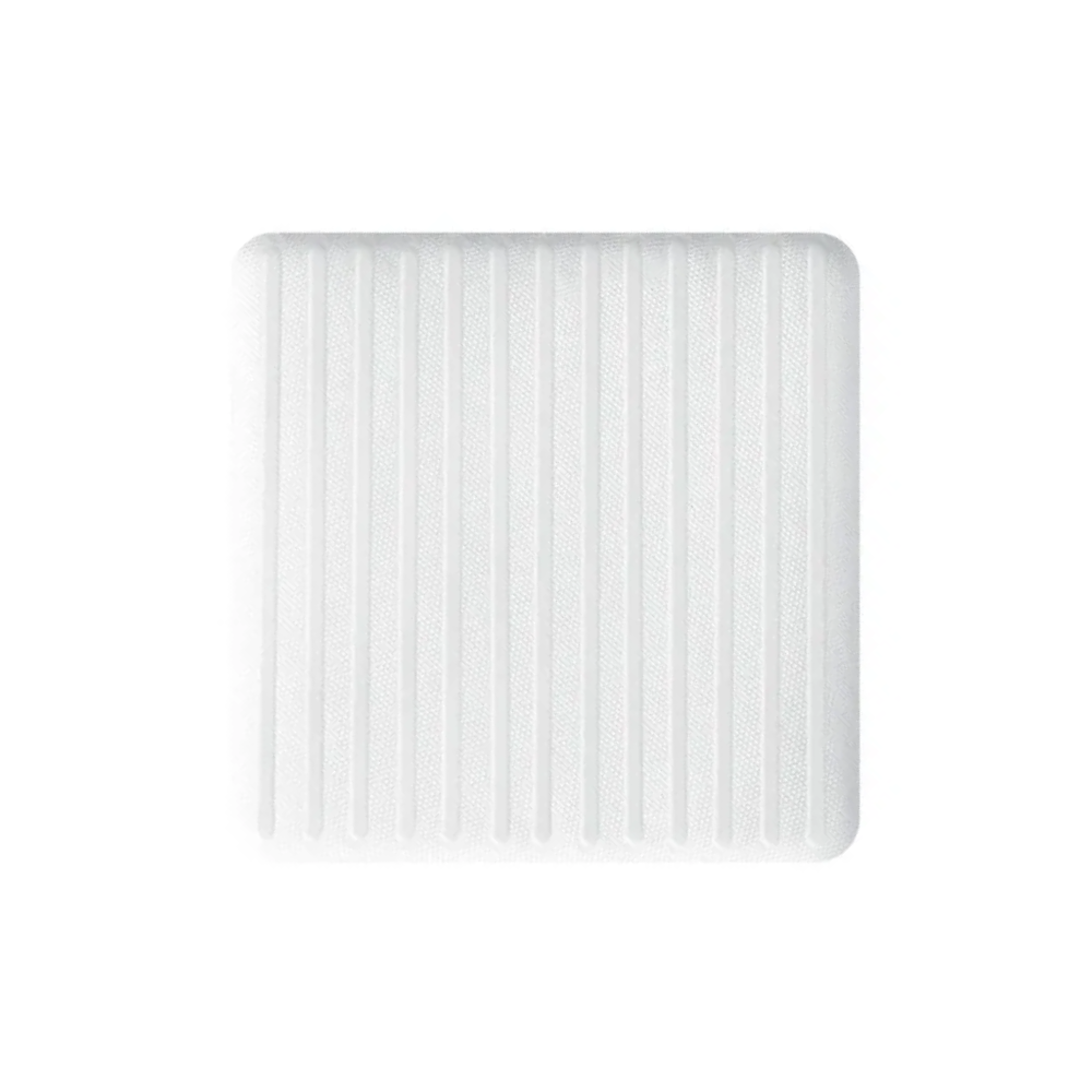 A white, rectangular air filter with vertical ribs, designed for Hartmann HydroClean® wound dressing, various sizes - 10 pieces by Paul Hartmann AG, isolated on white background.