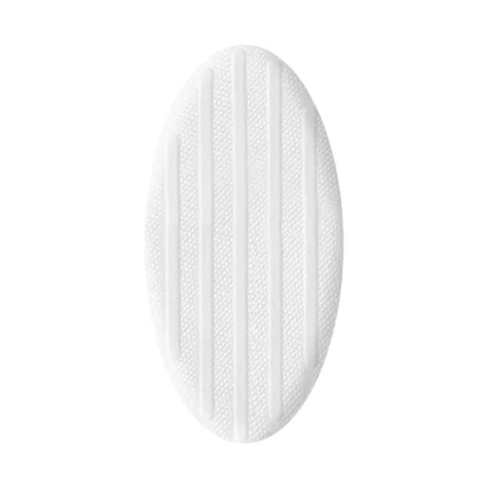 A white, oval rubber mat with raised, textured lines for slip resistance, suitable for wet therapy of wounds, isolated on white background. It resembles the Hartmann HydroClean® wound dressing from Paul Hartmann AG.