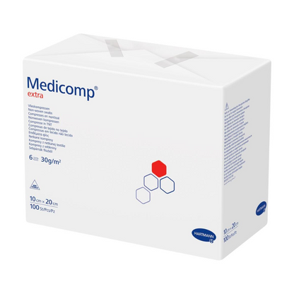 A box of Hartmann Medicomp® extra non-sterile gauze compress - 100 pieces by Paul Hartmann AG, with text and logos predominantly in blue and red on a white background. Sizes and quantities are indicated on the box.