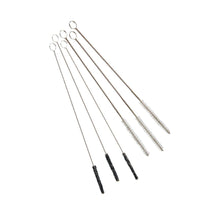 The Haug nozzle brush set with V2A stainless steel 6-piece from Haug Bürsten KG includes five thin cleaning brushes with stainless steel handles and loop ends, with colored bristles: two black, two white, and one gray. Ideal for detailed professional cleaning tasks.