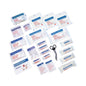 A Holthaus Medical complete assortment first aid kit DIN 13169 from Holthaus Medical GmbH & Co. KG with various medical items is spread out. The items include adhesive plasters, gauze compresses, antiseptic wipes, medical tape, and scissors. Each item of this filled first aid kit (pack of 126 pieces) is individually packaged in small plastic sleeves.
