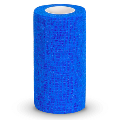 A roll of Holthaus VliVet® self-adhesive bandage for veterinary use from Holthaus Medical GmbH & Co. KG stands upright against a white background. This blue bandage, often used for hoof care in the veterinary field, has a textured surface and is cylindrically shaped with a hollow core.