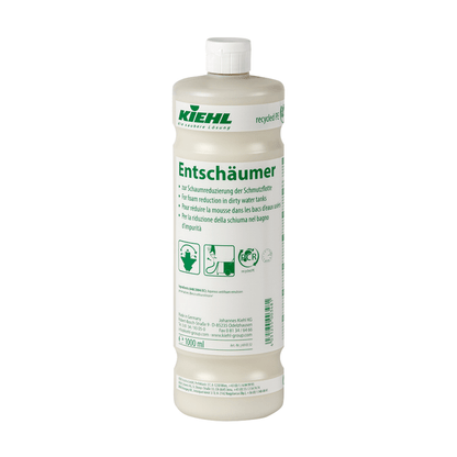 A white 1-liter plastic bottle labeled "Kiehl Entschäumer for foam reduction of the dirty fleet" by Johannes Kiehl KG, used for foam reduction in wastewater tanks; the green label contains a multilingual instruction.