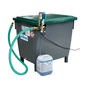 A large gray-green chemical dispenser with a hose, dosing system, and transparent tube leads to a container with liquid labeled "Kiehl Server special size on request | Package (1 piece)" by Johannes Kiehl KG.