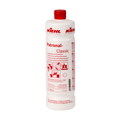 The white 1-liter bottle of Kiehl Patronal-Classic sanitary cleaner with protective formula from Johannes Kiehl KG is equipped with a red cap, red lettering, multilingual instructions, application symbols, and product details, emphasizing the biodegradable protective formula.