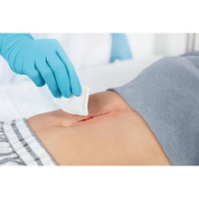 Band-Aids, sterile cotton gauze pads – in use
