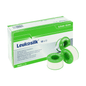 Pictured is a box of BSN Medical GmbH Leukosilk adhesive tape (9.2 m x 2.5 cm, pack of 12 rolls) with three white bands on green spools; The multilingual box highlights the easy fixation of bandages and can be removed without leaving residues.
