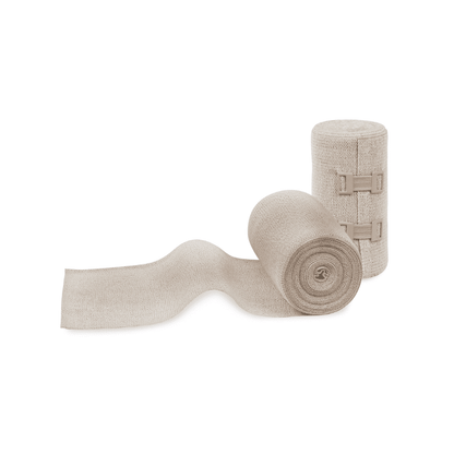 Two Meditrade ABE® Extra compression bandages, one partially unrolled, on a white background. Both have visible Velcro fasteners.