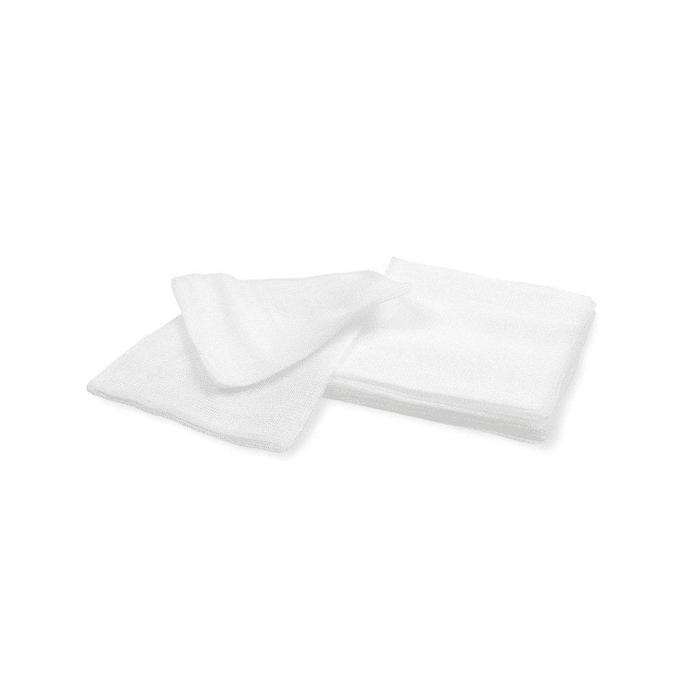 Two white terry towels from Meditrade GmbH, neatly folded and overlapping each other on a sterile white background.