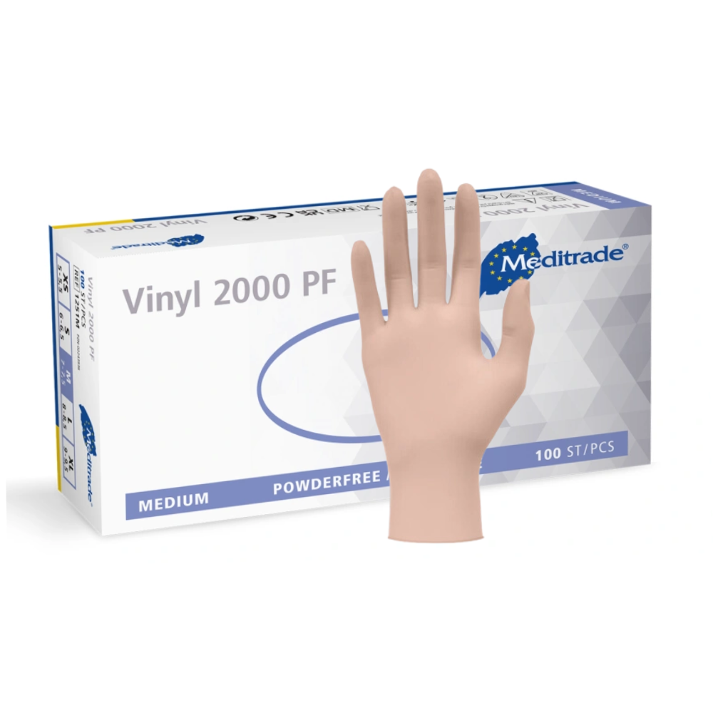 A box of Meditrade Vinyl 2000 PF disposable gloves made of vinyl from Meditrade GmbH, with one glove partially sticking out of the box. The box is white and blue and contains text with detailed product specifications.