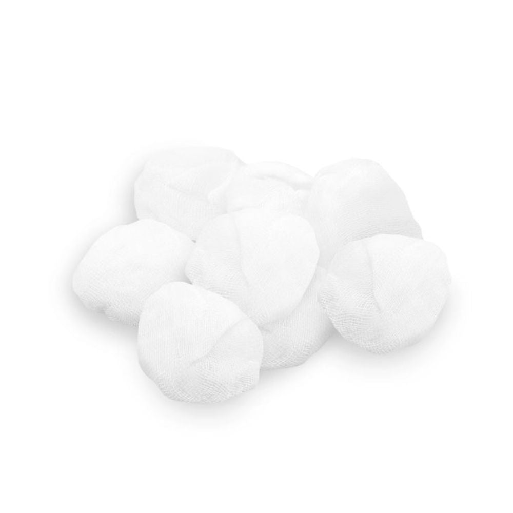 A stack of round, white Meditrade BeeSana® gauze swabs without RöKo, non-sterile, 10 x 10 cm (hazelnut-sized), ideal for wound care; pack of 500 pieces by Meditrade GmbH on a white background.