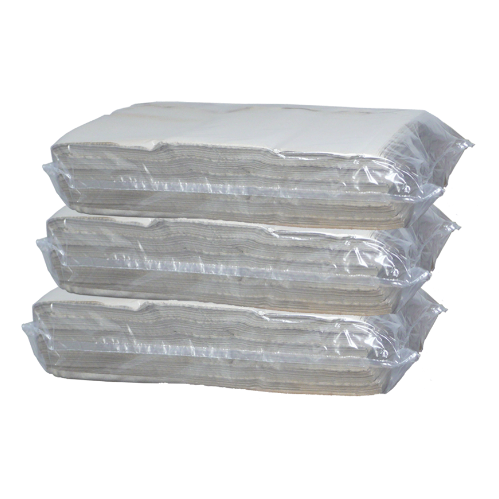 Stacks of Meditrade® cellulose in layers, 20 x 30 cm | Carton (3 bags) by Meditrade GmbH, packed in transparent plastic packaging, are arranged in a horizontal stack, ideal for hygienic applications and medical needs.