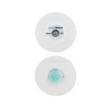 The image shows two round foam electrodes. The upper electrode bears the inscription "Servoprax GmbH", indicating the liquid gel technology. The lower electrode has a visible blue-green gel center. Both are manufactured for medical use and equipped with a snap connector for easy application.