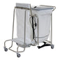 The Novocal stainless steel laundry collector "Compact plus" dual combination collector features a stainless steel frame, four wheels, a plastic bag holder, a foot pedal, a rectangular container with a gray lid, and a rolled-up cable for added convenience.