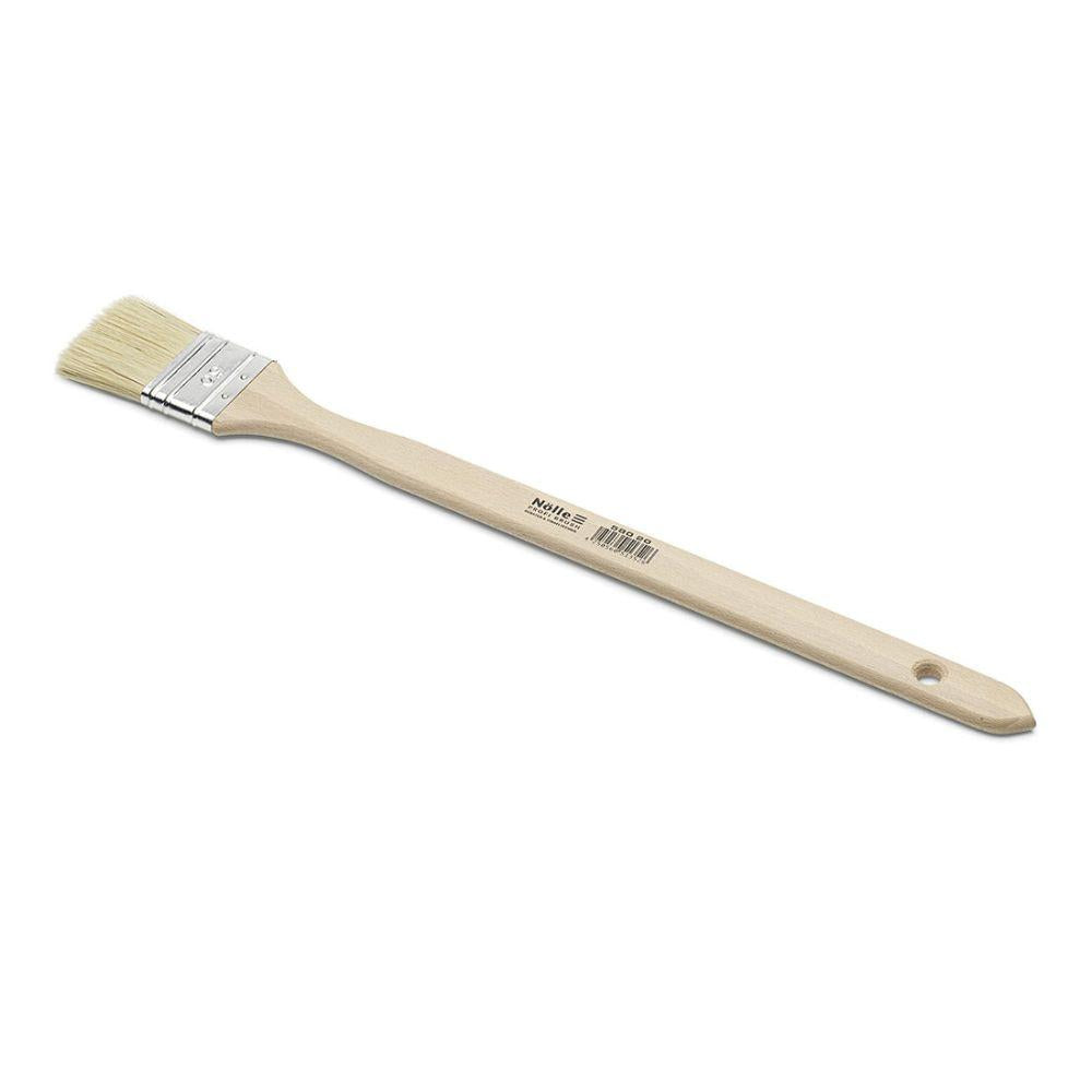 The Nölle Profi Brush radiator brush features a long wooden handle with a small hanging hole, light natural bristles, and a metal ferrule, all crafted in the craftsmanship of Nölle Profi Brush Bürsten- & Pinseltechnik e.K.