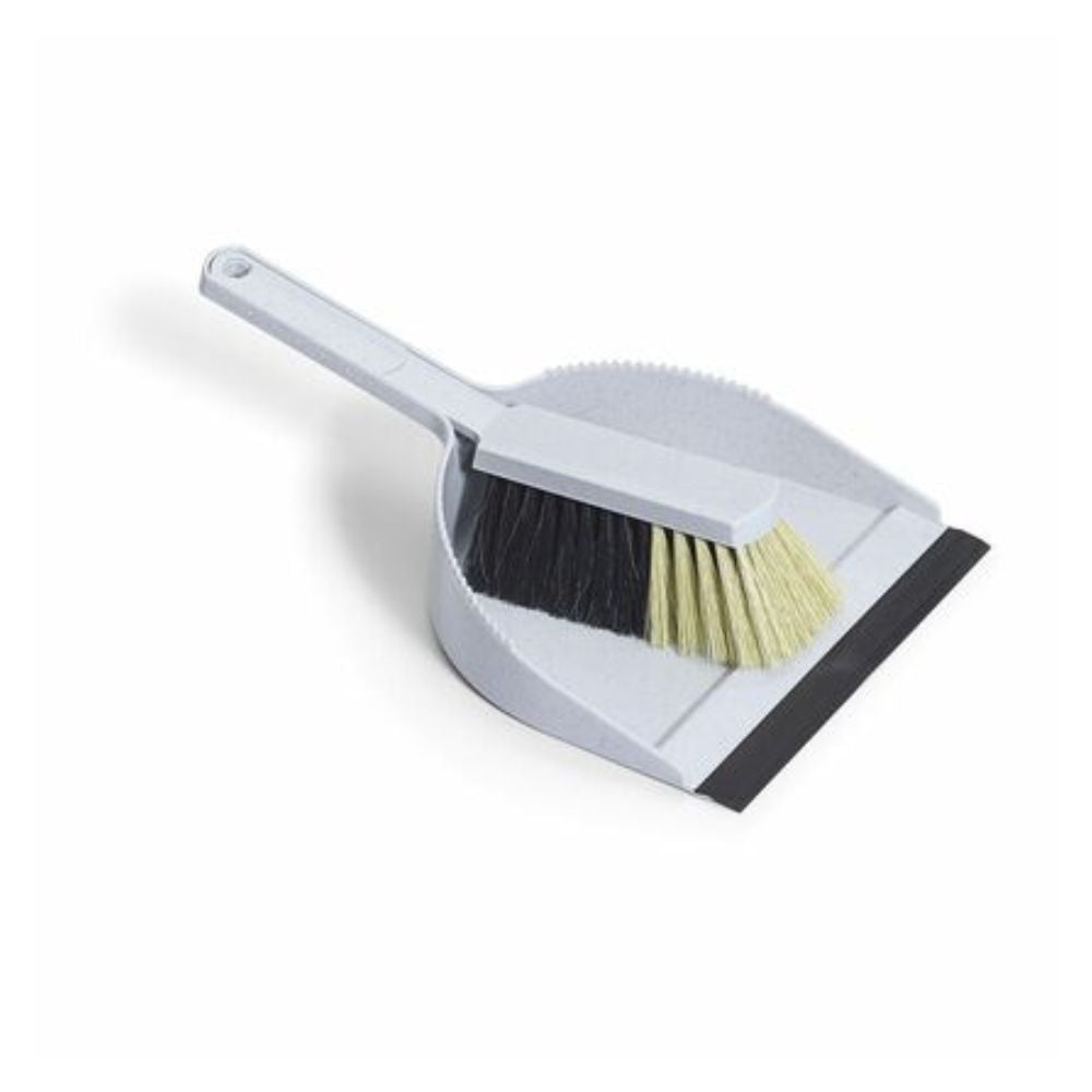 The Nölle Profi Brush Sweeping Set Hair Mixture with TPE Lip includes a small gray dustpan and a matching brush with black and cream synthetic bristles, designed for easy sweeping and convenient storage.