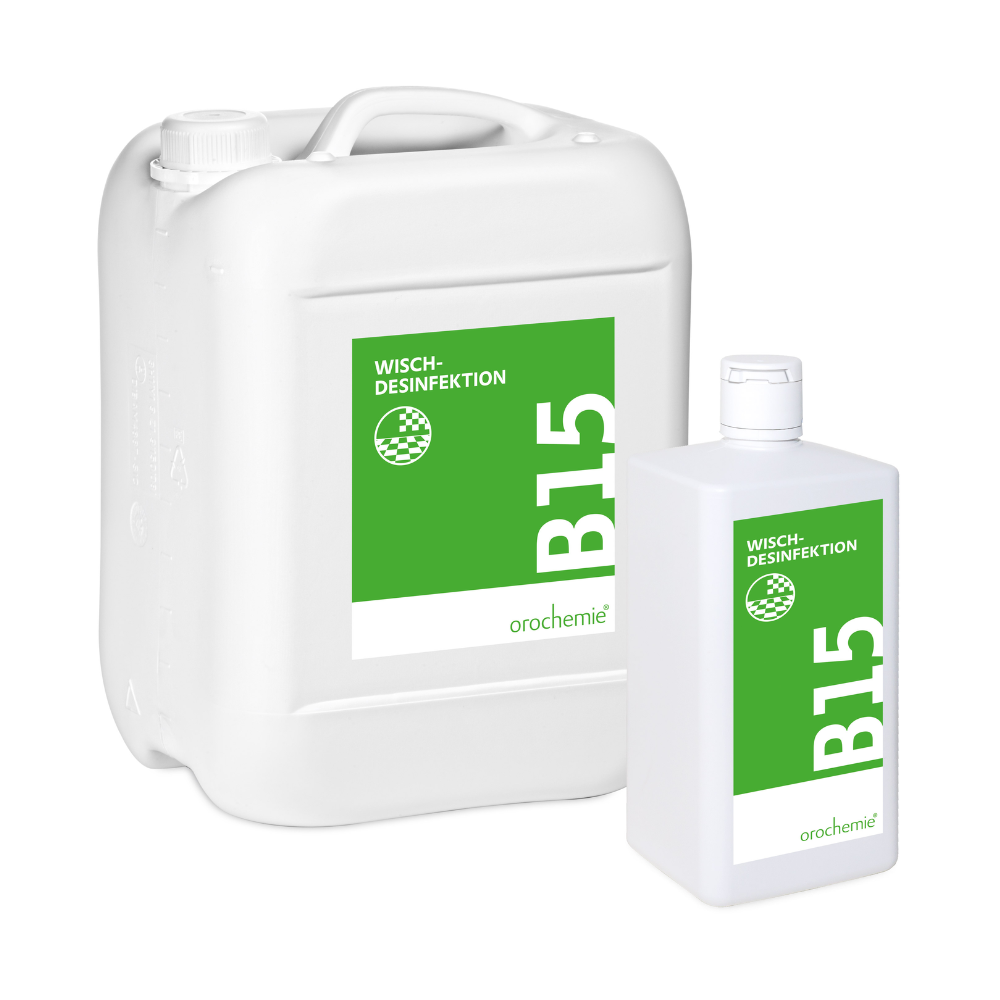 Two white containers - a large canister, a smaller bottle - bear green and white labels with the inscription "Orochemie B 15 Wischdesinfektion" of orochemie GmbH + Co KG, an effective concentrate against all viruses for surface disinfection.
