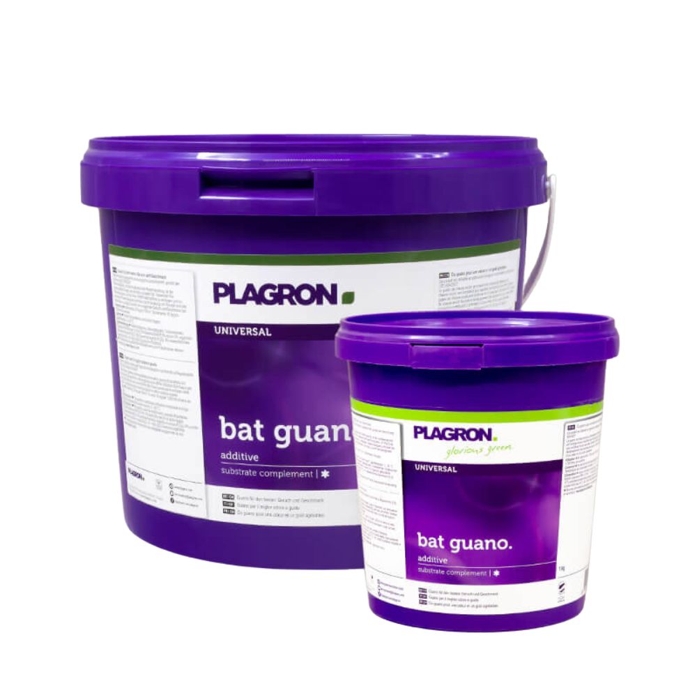 Two plastic containers with Plagron Bat Guano from Bertels B.V. are displayed, with the larger one standing behind the smaller one. Both have purple lids and labels with product information and trademarks.