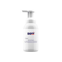 The "Seni fresh Active Foam for the removal of urine stains" from TZMO Deutschland GmbH is a white bottle with a pump dispenser for removing urine stains and eliminating odors, with German descriptions highlighting its effectiveness.