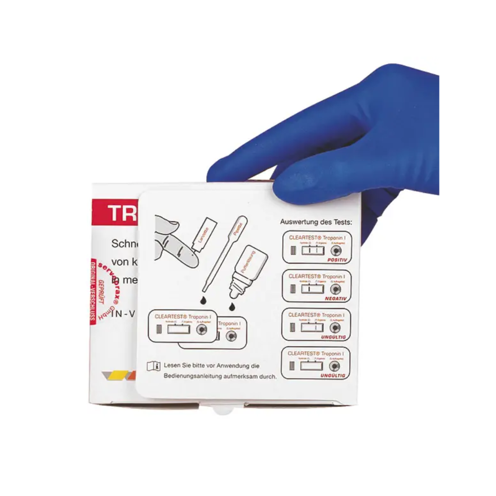 A hand with a blue glove holds a box with instructions for the Cleartest® Troponin I Whole Blood Infarction Test from Servoprax GmbH, which is crucial for diagnosing a heart attack. The detailed illustrations provide instructions on using a pipette and interpreting the results marked as positive and negative with text in German.