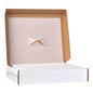 A white cardboard box with an open lid reveals a light brown interior and a diagonal cut in the inner lid as a flap. On the outside it says "ABSORBING SOPA", ideal for healthcare providers seeking an efficient, hygienic solution. Product: Servoprax disposable nasal slit wipes made of paper by Altruan.