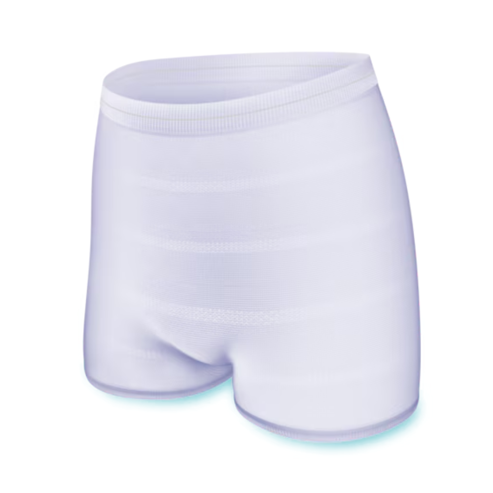 The image shows a white, seamless TENA Fix incontinence fixing pant from TENA – Essity Germany GmbH with a snug waistband. The smooth and slightly reflective fabric suggests that it is stretchy and comfortable, making it ideal for incontinence fixing pants. The pant stands out with a clear and minimalist design.