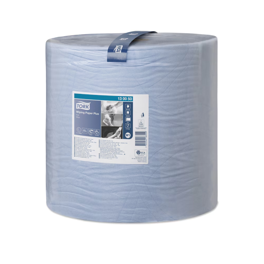 A large roll of high-quality Tork 130050 Strong Multi-Purpose Paper Wipers Premium W1 in a plastic packaging. The label on the front contains product details, including instructions for use and brand elements, highlighting these highly absorbent wipers as essential for any cleaning task.
