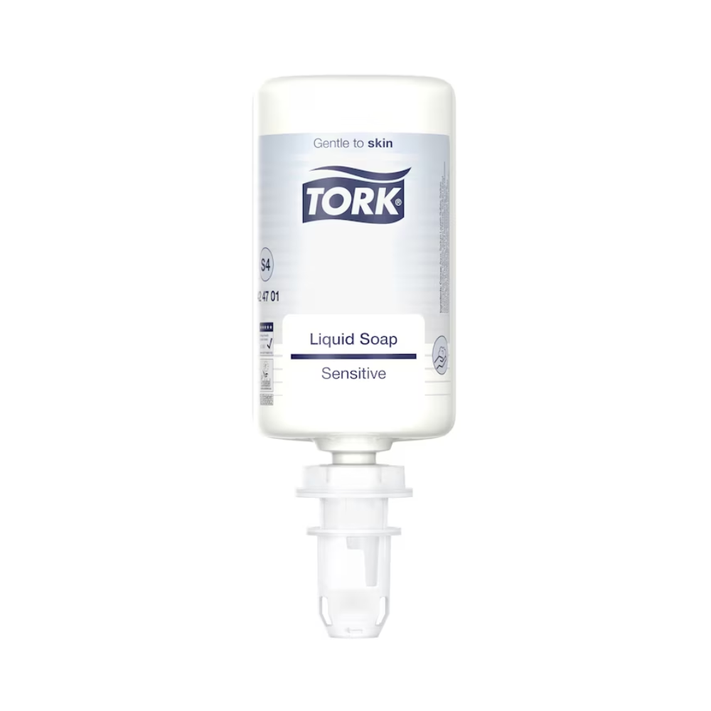 A white bottle of Tork 424701 Sensitive Liquid Soap 1000 ml is seen against a plain background. The label highlights the skin-friendly properties that make the soap ideal for sensitive skin. The bottle features a dispensing nozzle and emphasizes its gentle effect with natural ingredients.