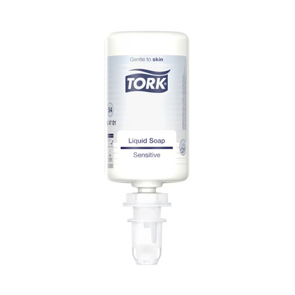A white bottle of Tork 424701 Sensitive Liquid Soap 1000 ml is seen against a plain background. The label highlights the skin-friendly properties that make the soap ideal for sensitive skin. The bottle features a dispensing nozzle and emphasizes its gentle effect with natural ingredients.