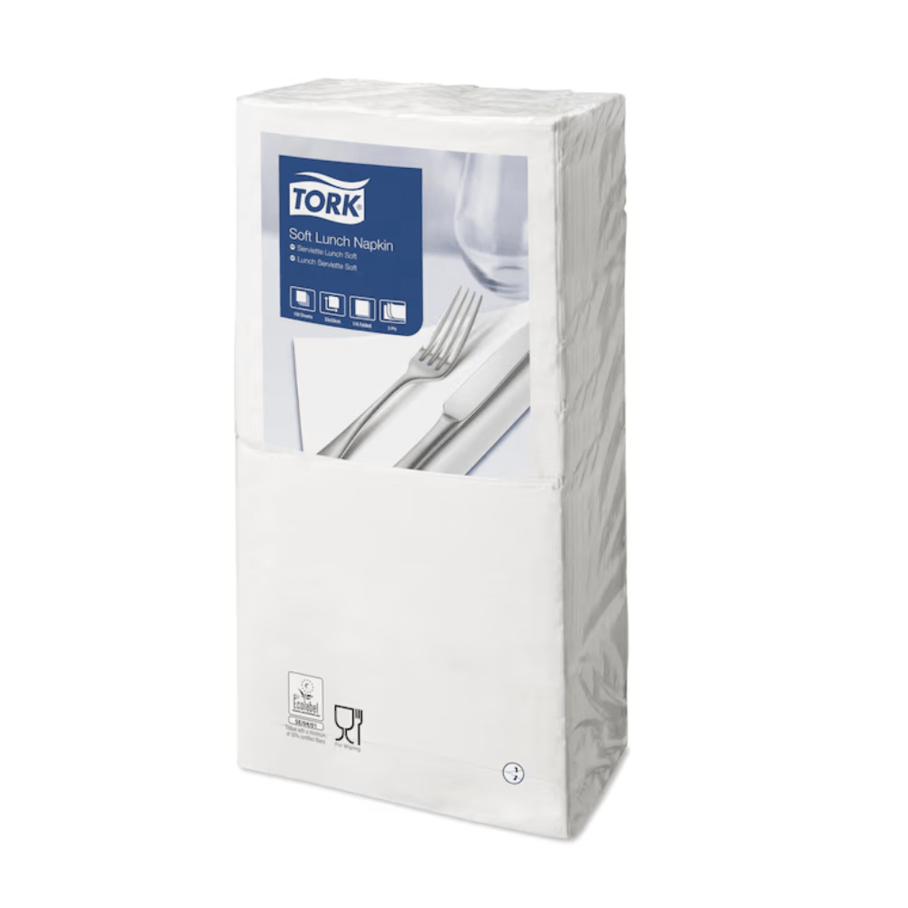 A package of Tork 477414 Soft Lunch Napkins, White, Advanced, 3-ply is packaged in clear plastic. The front label shows a picture of white napkins with a fork and knife. The packaging features recycling and food safety symbols indicating that these napkins are industrially compostable. Brand: TORK - Essity Professional Hygiene Germany GmbH.