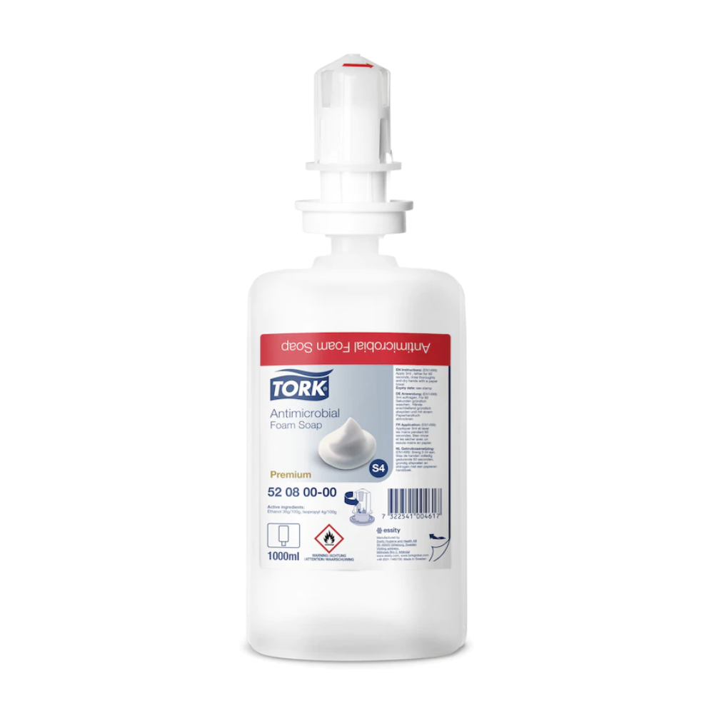 A 1000 ml Tork 520800 foam soap for hand decontamination Premium S4 bottle by TORK - Essity Professional Hygiene Germany GmbH, with a white dispenser head and a red label. EN 1499 certified, ideal for effective hand decontamination.