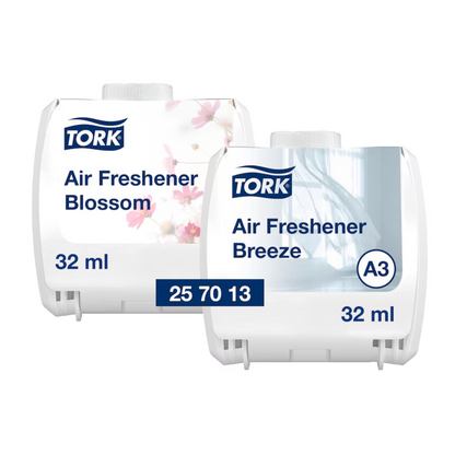 Displayed are two Tork Continuous Air Freshener dispensers from TORK – Essity Professional Hygiene Germany GmbH. One of the dispensers, called "Blossom", shows floral motifs, while the other, "Breeze", features a serene window scene. Both have a capacity of 32 ml and are equipped with product codes; one shows "25 70 13" and the other "A3".