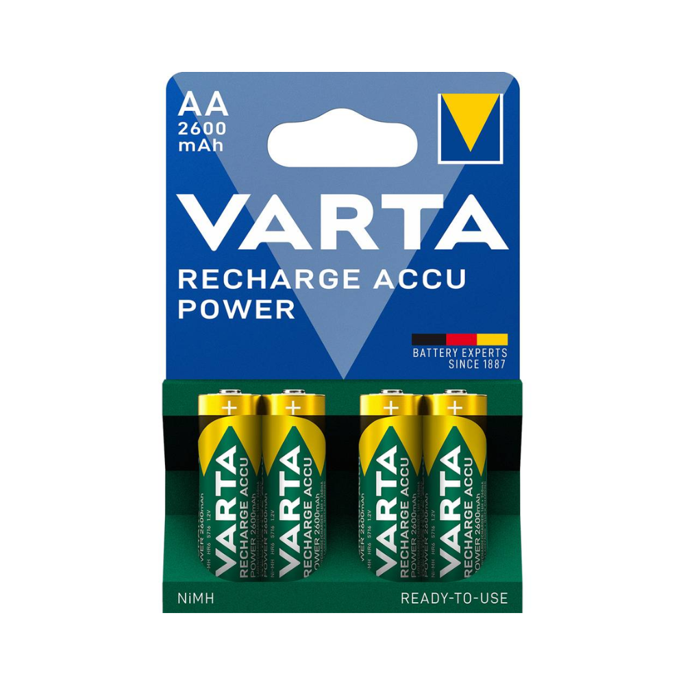 A pack of four green-yellow Varta Recharge Accu Power AA 2600 mAh batteries, labeled "Nickel Hybrid" on the front. On the packaging, there is a blue triangle with Varta AG visible.