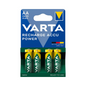 A pack of four green-yellow Varta Recharge Accu Power AA 2600 mAh batteries, labeled "Nickel Hybrid" on the front. On the packaging, there is a blue triangle with Varta AG visible.