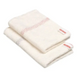 Two neatly folded white bath towels with a subtle red-gray stripe pattern on the edges and a small red-white label each offer a touch of luxury reminiscent of the hygiene standards of Vileda Professional's floor cleaning products.