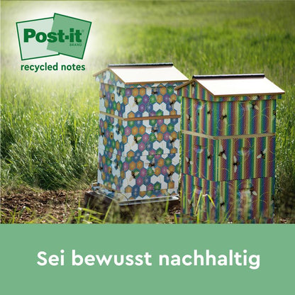 Two colorful beehives stand in the grass of a field. The 3M Post-it® Recycling Z-Notes (76 x 76 mm, 100% PEFC) logo appears at the top left. At the bottom is a German text: "Be consciously sustainable.