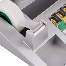 A close-up of the 3M Deutschland GmbH Post-it® Desk Organizer with Post-it® Notes, Index, and Scotch® Magic™ Tape (1 piece), showing the tape dispenser with a serrated edge and the adjacent desk organizer compartments.