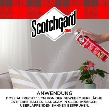 A hand sprays Scotchgard™ Textile Protector Spray, 400 ml from 3M Deutschland GmbH onto a striped cushion on a gray sofa, providing protection against dirt and stains. A green plant is nearby; the German instructions are visible at the bottom.