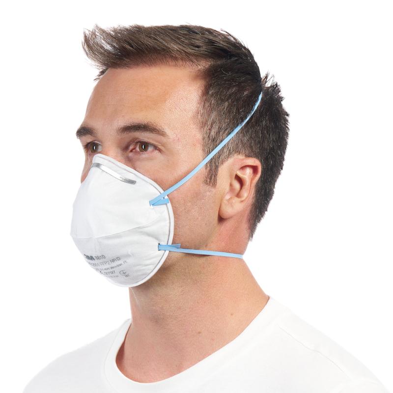 A man wearing a 3M™ Particulate Respirator 8810, FFP2, without valve (3M Deutschland GmbH) is seen in side view against a plain white background.