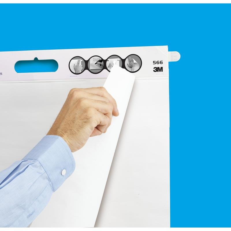 A person in a light blue shirt pulls a sheet from a 3M Post-it® Super Sticky self-adhesive Meeting Chart for wall mounting 566 (58.4 x 50.8 cm, white, 20 sheets, incl. Command™ strips) in front of a solid blue background with an illustrated instruction above it.